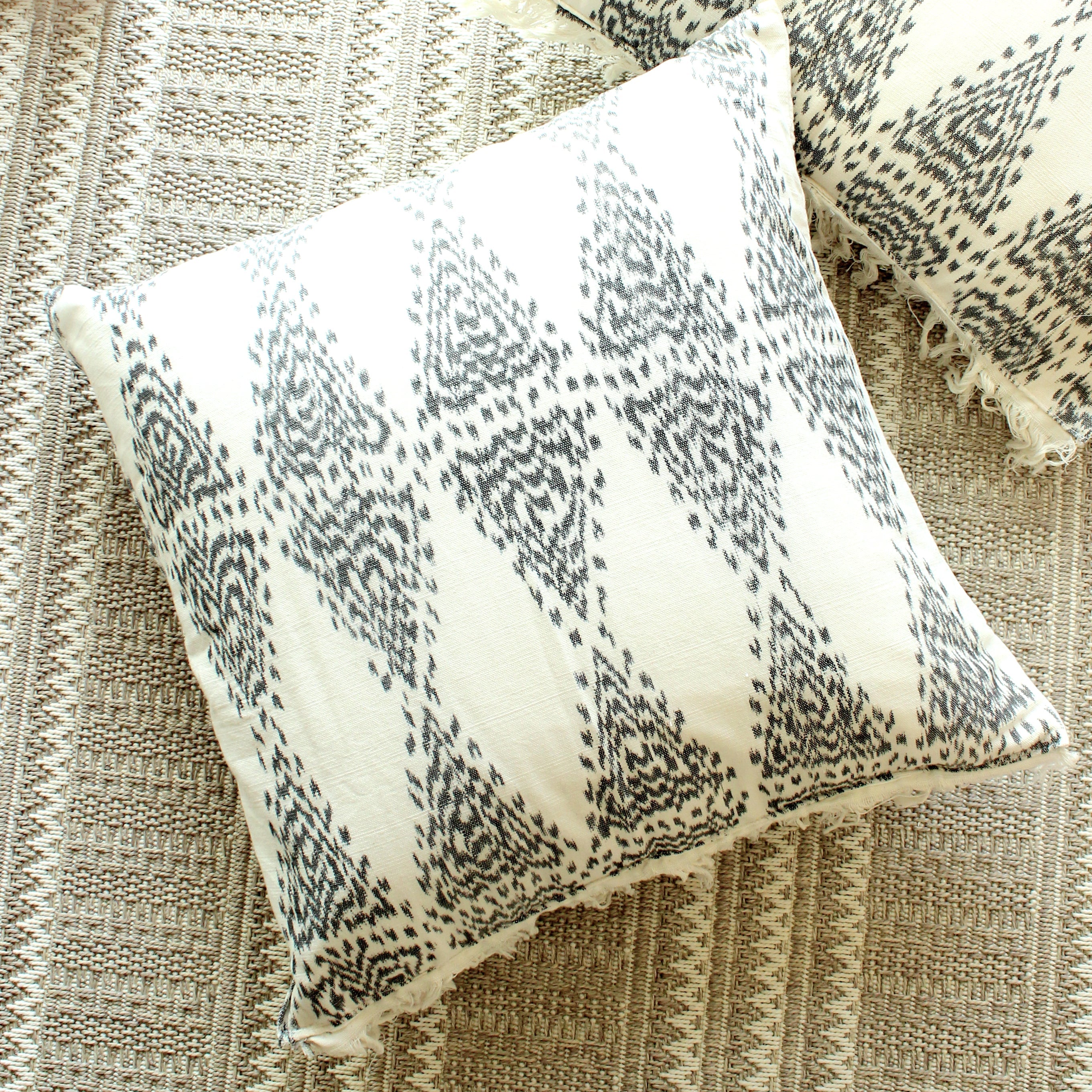 java-bliss-ikat-pillow-conscious-clothing-accessories-brunnaco-ivory Java Bliss Ikat Pillow - Image 1